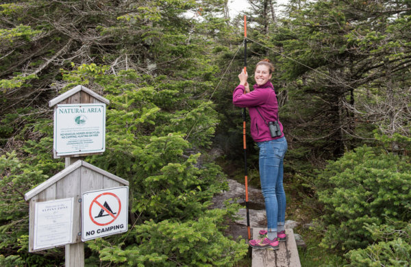 Liza sets up a mist net for a long-term bird banding station on Mt. Mansfield during her time as an Americorps member with Vermont Center for Ecostudies. Courtesy Photo/Charles Gangas